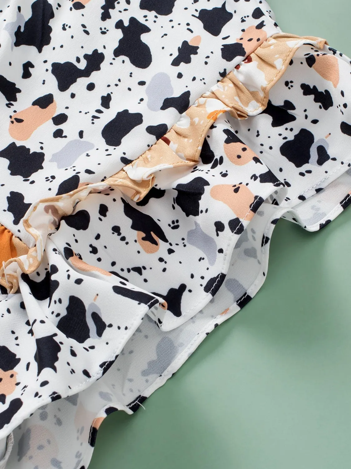TEEK - White Ruffled Printed Mock Neck Cap Sleeve Blouse
